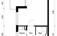 Der Grundriss zeigt ein 1-Zimmer-Apartment mit Balkon, Küche, Bad und Flur in kompakter Anordnung.